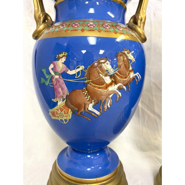 Ceramic Early 20th Century European Neoclassical Hand Painted Blue Porcelain Urns With Chariot Scenes- a Pair For Sale - Image 7 of 12