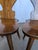 Vintage wooden dining chairs in traditional Tyrolean (Alpine) style. with a shaped backrest and characteristic heart cut-...
