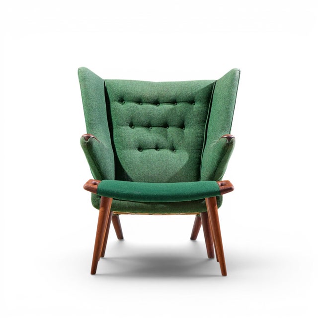 Hans Wegner for AP Stolen AP19 Mid Century Papa Bear Chair and Ottoman The chair measures: 36.25 wide x 36 deep x 39 high,...