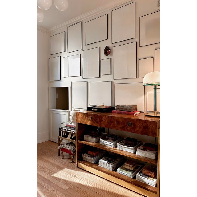 We are very pleased to offer a burl wood and brass console by Founders, circa 1970s. This striking piece showcases richly...