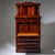 Large Biedermeier secretary cabinet with a shaped apron, rounded corners, and three lower drawers. Above are a flat fall-...