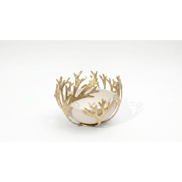The neiredes fruit bowl, brass and porcelain, by auste ost dimensions: w 19 x d 19 x h 17 cm materials: brass, porcelain....