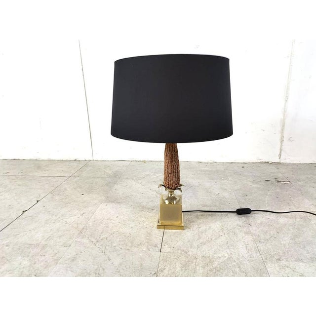 Charming corn table lamp. The corn sculpture is made of resin and is nicely detailed. Brass base and new black and golden...
