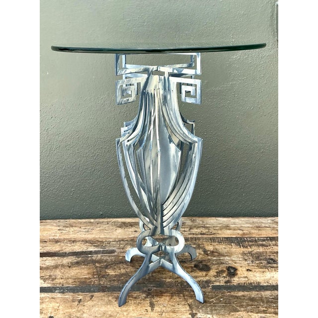 This vintage drinks table combines timeless classical design with the glamorous sophistication of Hollywood Regency style....