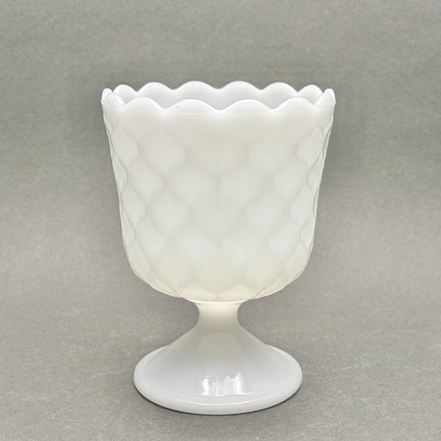This vintage milk glass pedestal goblet planter by E.O. Brody Co. features a classic raised diamond pattern and a charming...