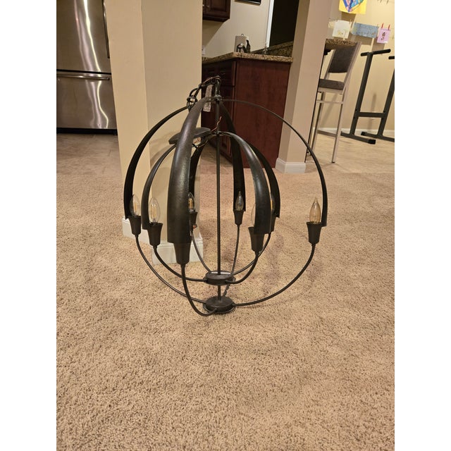 Hubbardton Forge bronze chandelier, originally purchased for my boutique optometric practice. Recently moved locations and...