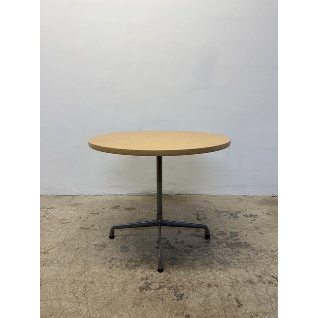 Herman Miller Aluminum Group cafe bistro / dining table with oak veneer top on an aluminum base originally designed by...