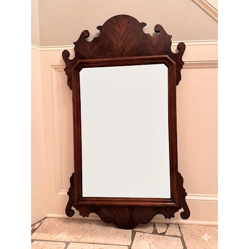 A grand and beautifully crafted traditional wall mirror by the renowned American furniture maker, Henredon. Featuring a...
