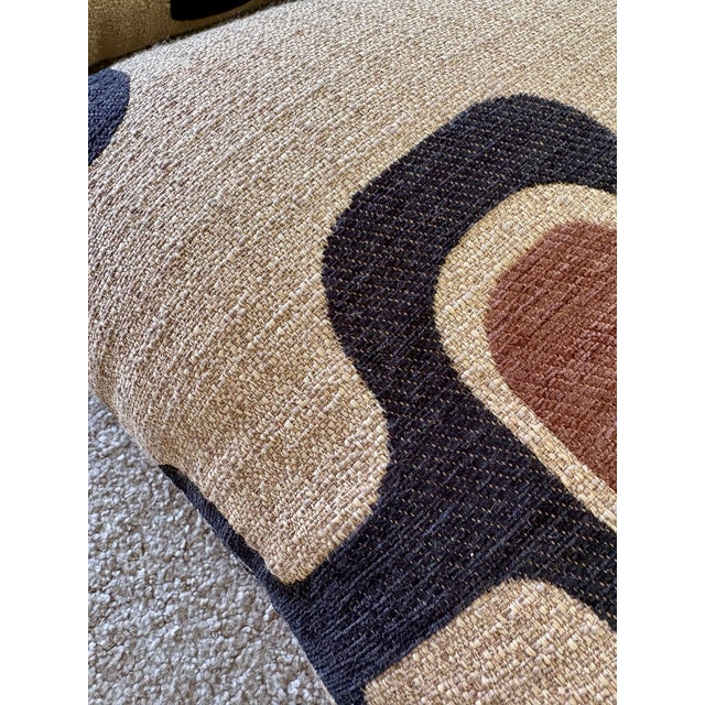 Art decor pattern brown, black, and taupe color throw pillow. Does not have a zipper. Handmade. Styled on a bed in our...