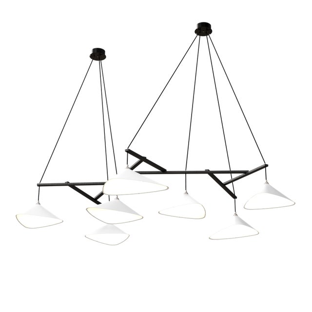 Emily is a series of handmade sheet steel lampshades in various finishes and spatial arrangements. _ Emily was inspired by...