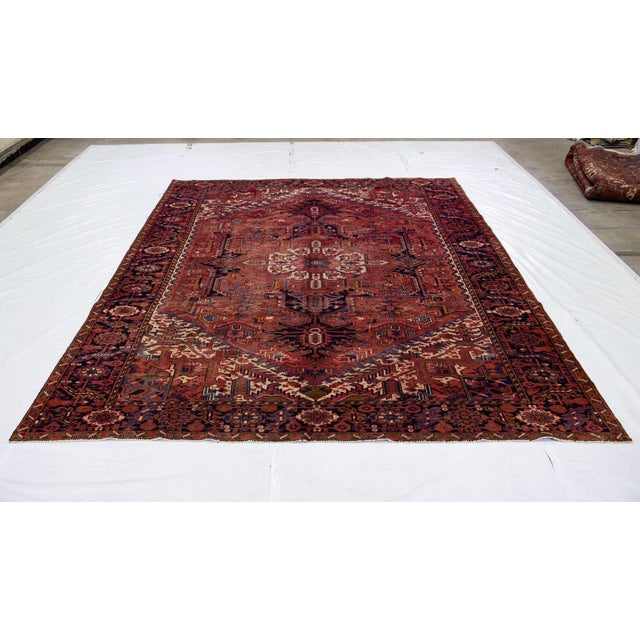 This exquisite rug showcases the artistry of the 1950s with its intricate medallion design, rendered in rich shades of...