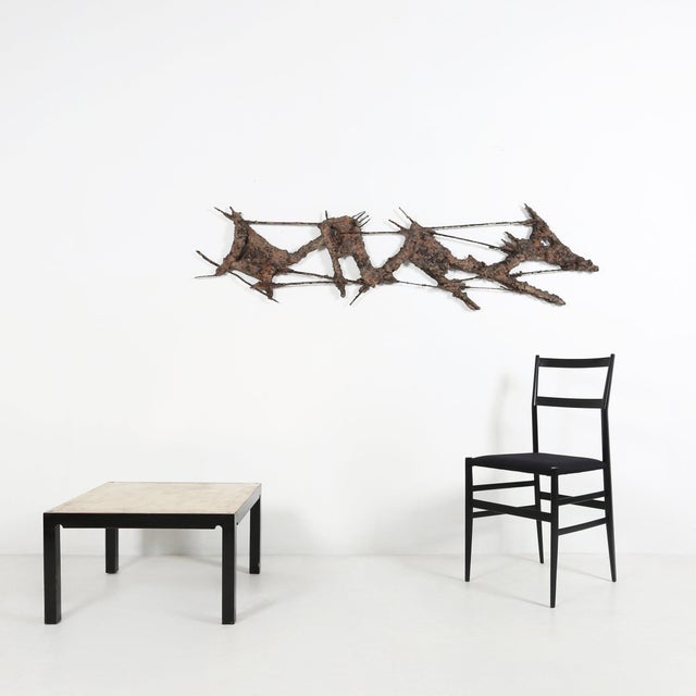 A powerful and architecturally expressive Brutalist wall sculpture designed by Pia Manu, the Belgian artistic workshop led...