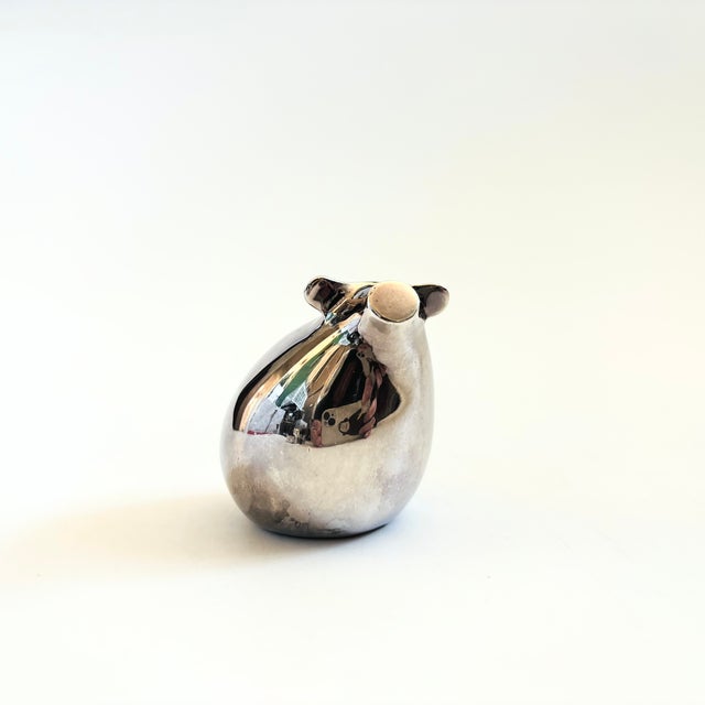 A vintage silver plated abstract figurine of a pig. Designed by Gunner Cyren for Dansk in the 1970s. Nice heavy weight...