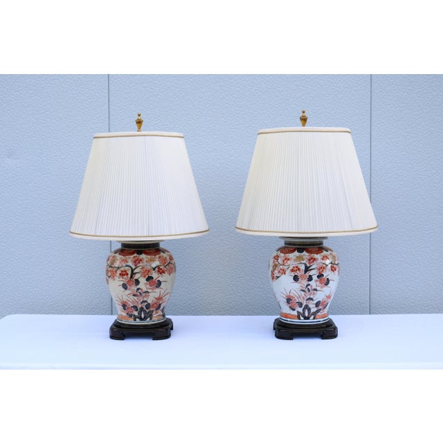 Stunning late 20th-century matching vintage pair of Japanese Imari porcelain ginger jar table lamps crafted by the high-...