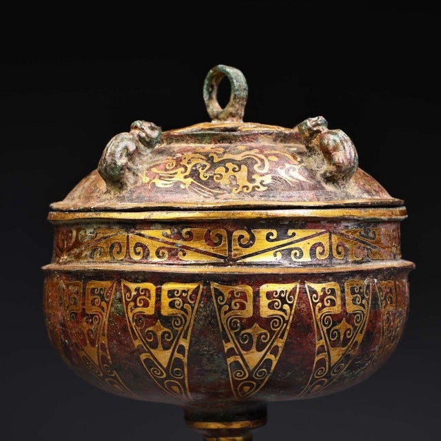 Magnificent archaic-style stemmed bronze censer with lavish gold inlaid ornamentation across the domed lid, rounded bowl,...