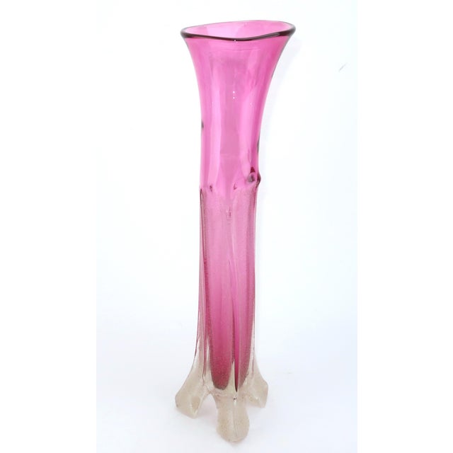 Long, tall and handsome! A 1997 art glass creation by American artist, Neal Drobnis. This tall beauty features a textural...