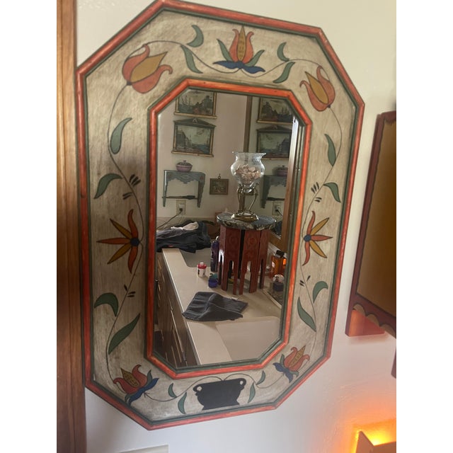 This stunning piece is an authentic 1930's Spanish hand-painted accent mirror, showcasing a timeless folk art style. The...