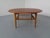 Round teak coffee table with rattan shelf by Johannes Andersen from the 1960s. I have official proof of authenticity such...