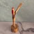 Whimsical pair of hand-carved and painted roosters. Made of wood. One each of small and large. Fun rustic farmhouse folk art.