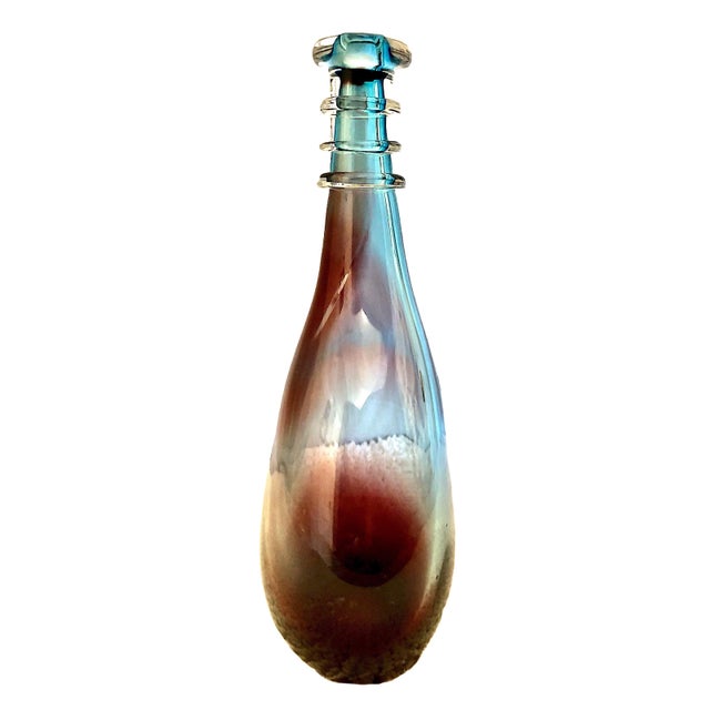 On offer is a beautiful Mid-Century Orrefors art glass decanter, handcrafted in Sweden, confirmed by the worn but iconic...