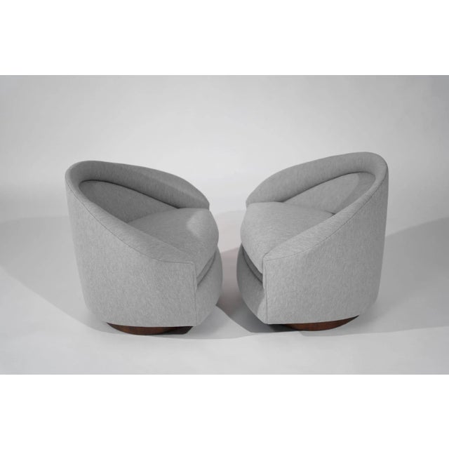 Craft Associates presents a rare find: a set of restored Adrian Pearsall swivel lounge chairs from the 1950s. Upholstered...