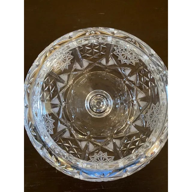 This elevated crystal candy dish is in good condition. It's 6" tall and 7.5" wide. Asking $60.00
