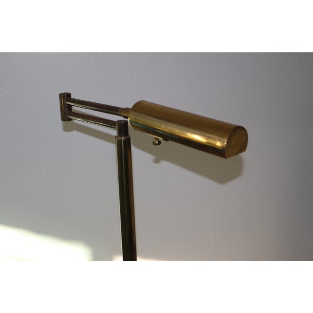 A vintage brass pharmacy lamp, 1960s. Newly rewired. In overall good condition with some patina to the brass. Height...