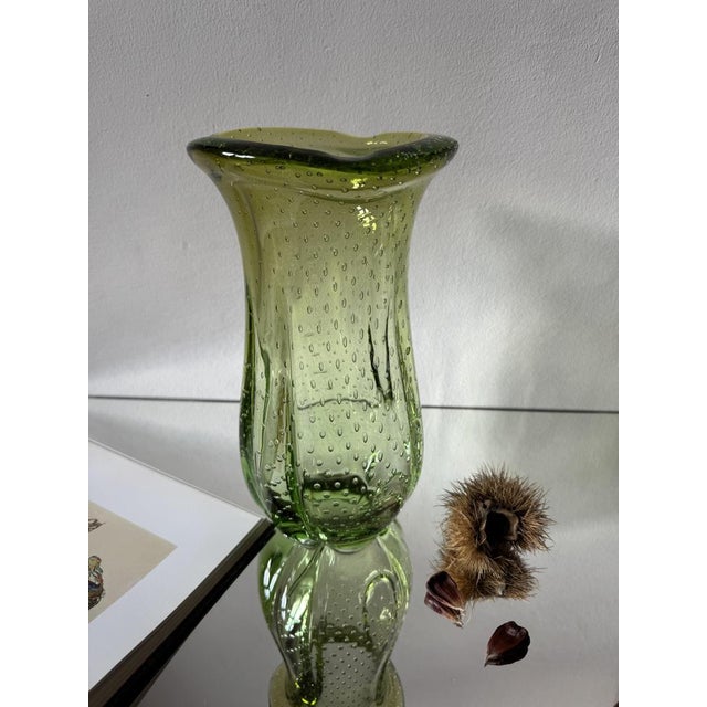 A sculptural Czech art glass vase designed by Hana Machovská and produced at the Mstišov glassworks in Czechoslovakia...