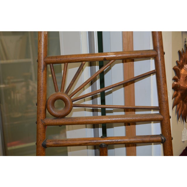 This is an awesome looking easel. I believe it dates from the early 1900's but has a very mid century look. Great shape...