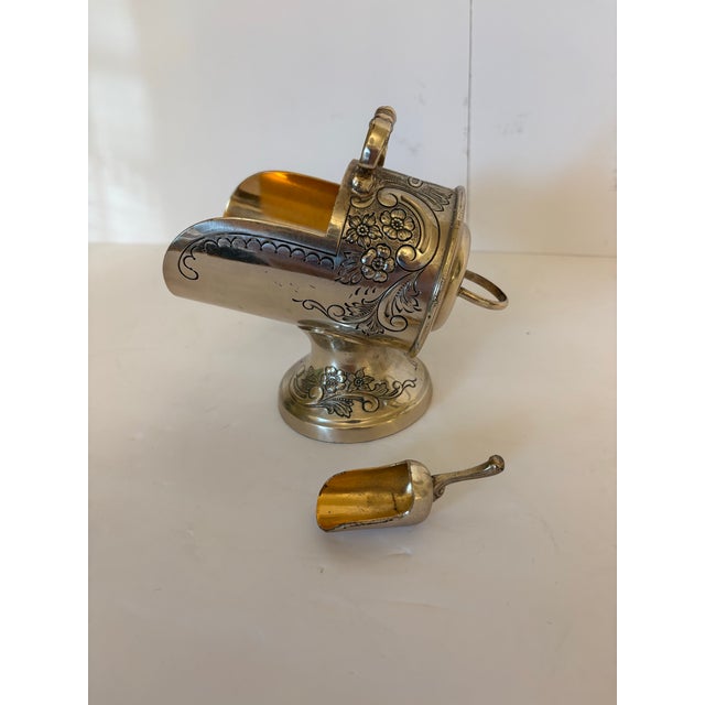 This vintage Raimond VIctorian style scuttle bowl has the dimensions of 5.5” high, 5.75” long by 3” wide. It was made...
