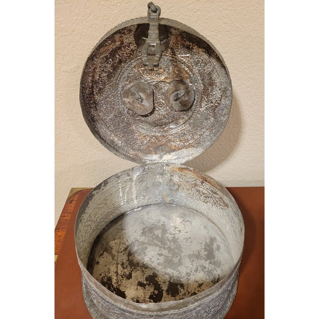 Beautiful handcrafted antique decorative round tinned copper Indian box with lid, latch, and handle. A very fine antique...