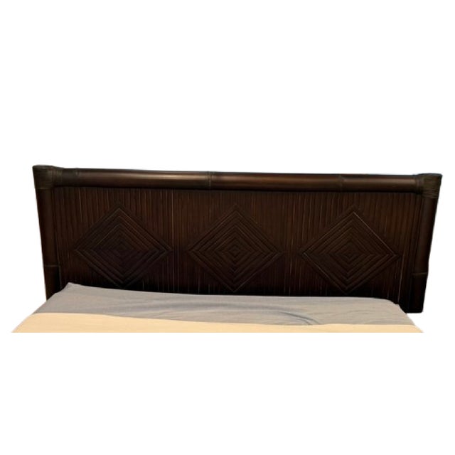 Custom made in Bali from bamboo, this Queen sized platform bed and matching nightstand feature unique woven and banding...
