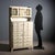 1950s laboratory cabinet. The cabinet features a double set of drawers that increase in size at the bottom, a marble top...