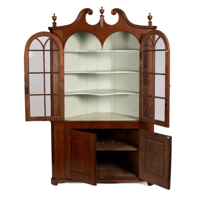 Handsome, stately yet informal architectural Federal design from the early 19th c. this corner cupboard is perfect in...