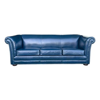 1960s Navy Blue Leather Roll-Arm Sofa With Brass Nailhead Trim and Wooden Bun Feet For Sale