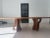 Suma dining room table by Uultis Studio with walnut veneered top measuring 110 inches and organic solid wood legs. Please...