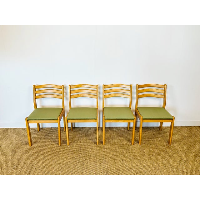 Set of four vintage scandinavian chairs in light wood, with a simple and functional design. their solid beechwood frame...