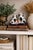 Late 19th century pair of English Staffordshire dogs with pups, featuring classic hand-painted decoration and traditional...