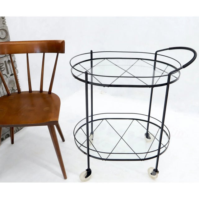 Mid-Century Modern oval serving cart circa 1950s George Nelson decor.