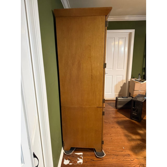 Transitional Office Armoire from Ethan Allen. Clean lines and simple paneled doors open to reveal your industrious center...