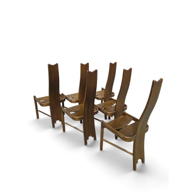 Specifications The brand Description These Allmilmo high back dining chairs bring a striking architectural presence to the...