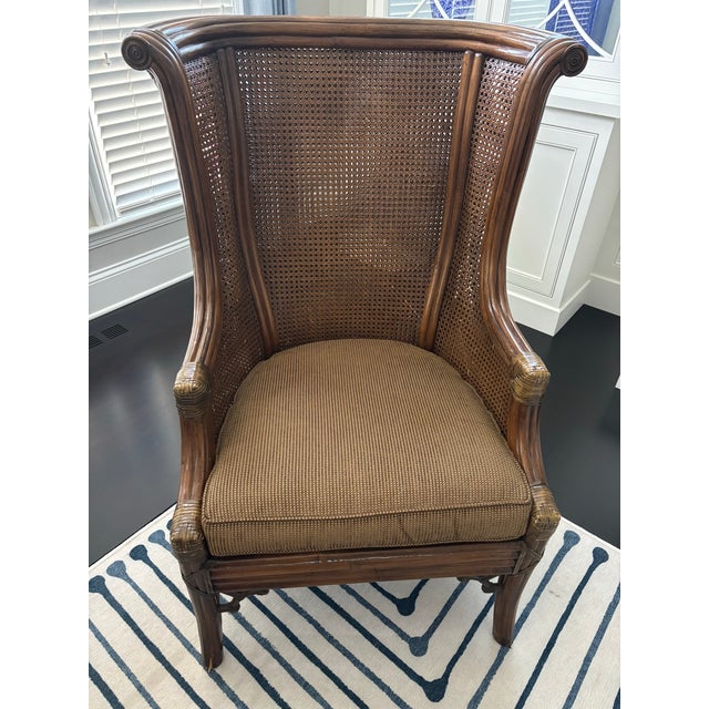 Bamboo Lane Venture Excursions Collection wingback armchair with caning at back and sides, original upholstery, bent...