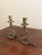 A striking pair of antique French brass serpent candle holders dating to the 1920s, sculpted with elegantly coiled bodies...