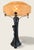 24” high, shade 14” wide. Tapered shaft on a curved triangular base, with a female figure nestled against it growing out...