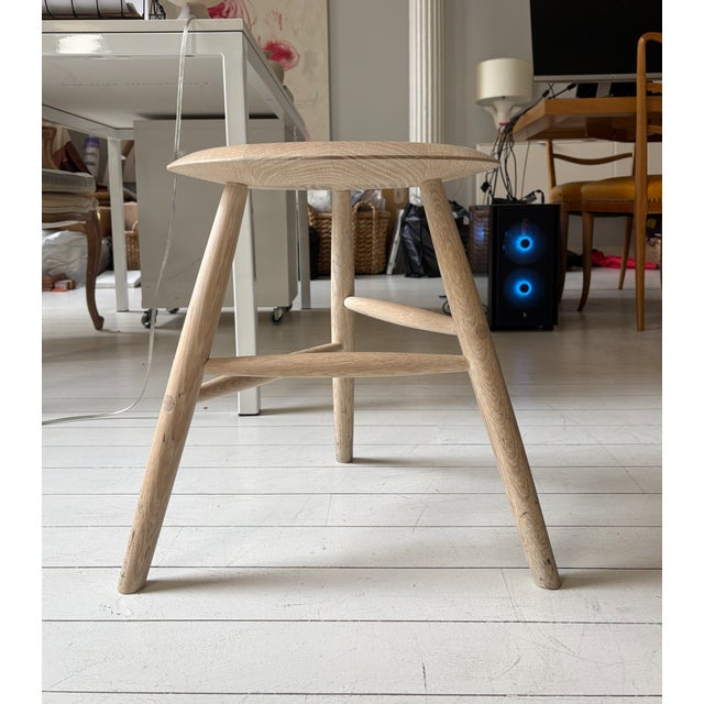 Sawkille Co. White Oak Stool Solid bleached white oak stool with a round seat and three legs. Dimensions: 15" Diameter x...