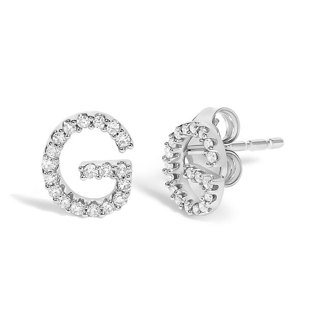 Expertly crafted to symbolize individuality and grace, this exquisite "G" initial stud earring is fashioned from radiant...