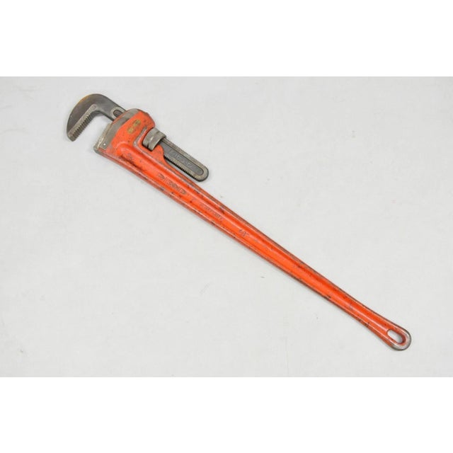 Vintage RIDGID 48 Heavy Duty Straight Plumbers Pipe Wrench 48" Red Cast Iron. Circa Late 20th Century. Measurements: 44" H...
