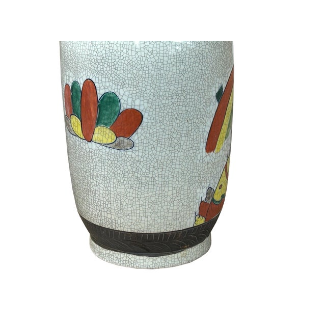 Immerse yourself in the grandeur of ancient artistry with this magnificent crackle glaze vase, a true testament to...