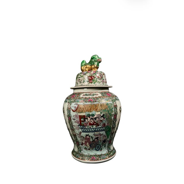 highly decorative Chinese Rose Medallion style enameled porcelain covered urn, richly decorated with colorful figural...