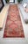 This rare extra-long vintage Oushak runner (3 ft 1 in x 13 ft 9 in) is a one-of-a-kind hand-knotted wool pile on a cotton...